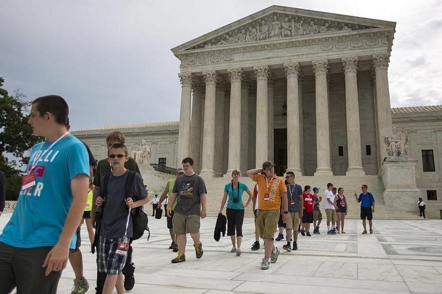 Tour groups visit the Supreme Court in Washington, DC on Monday. -- PHOTO: EPA