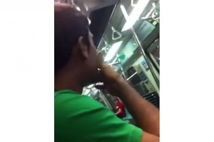 A video of the duo passing a cigarette amongst themselves, taking turns to puff on it, while a friend filmed the act, was posted on Facebook. -- SCREENGRAB: ALL SINGAPORE STUFF/FACEBOOK