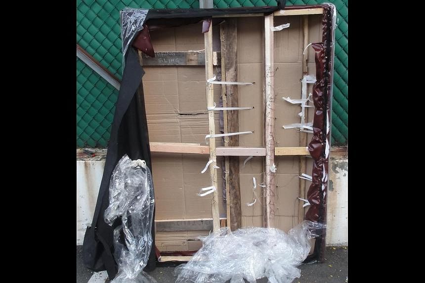 Duty-unpaid cigarettes were hidden in the hollow spaces within the modified bed headboards.&nbsp;-- PHOTO: SINGAPORE CUSTOMS
