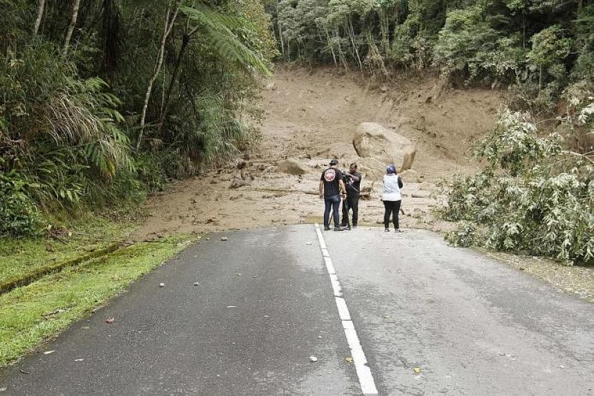 A road leading to the Mesilau Nature Centre damaged by the mudflow, which began at about 3pm on Monday, blocking roads and seriously damaging bridges.