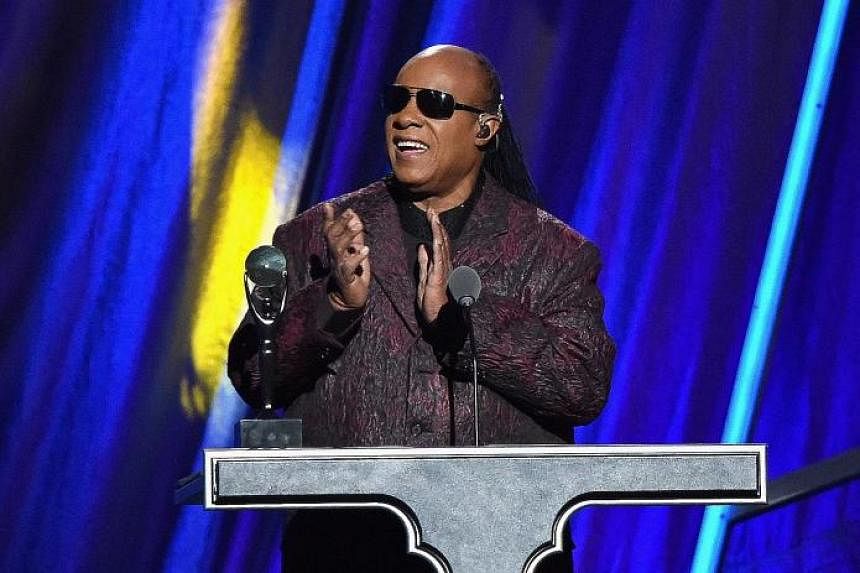 Singer Stevie Wonder (left) performed for about 500 guests at the White House last Saturday.