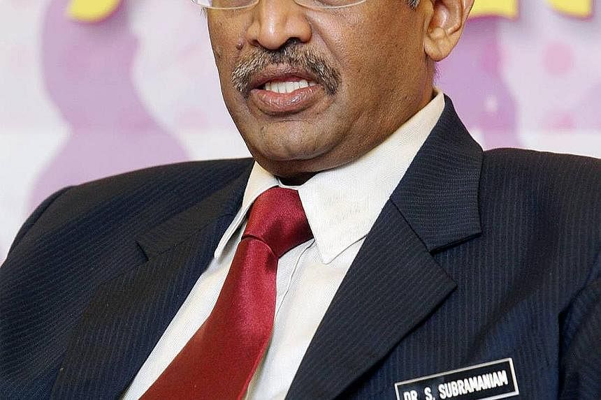 Hours after MIC president G. Palanivel (left) announced his deputy's suspension, Datuk Seri S. Subramaniam declared that he was taking over as acting president