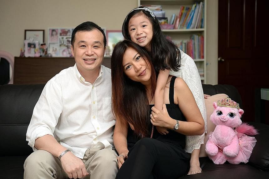 Renae, who turns five in August, with her parents, Mr Tong Peng Geat and Ms Ray Khorsuk. She was tested at three and found to have an IQ of 140. An average child's IQ is 100. Tricia, who turns four this year, with her parents, Mr Loke Chok Loon and M