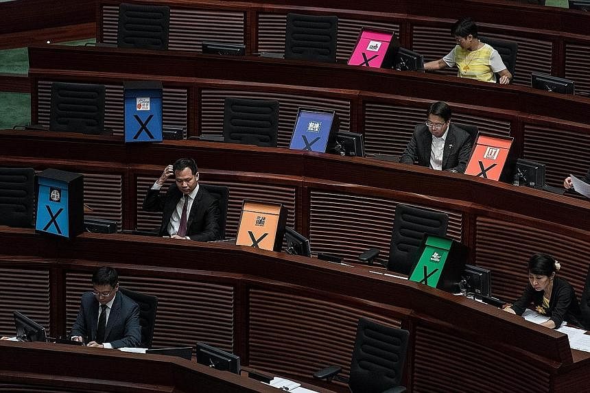 Placards symbolising a vote against the government's controversial electoral road map in Hong Kong's legislature yesterday.