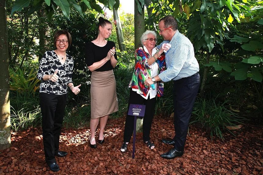 (From left) Gardens by the Bay deputy chief executive Peggy Chong; Australian High Commission second secretary Clele White; Mrs Finette Psarianos, and her son, Andrew, who adopted the tree (right).