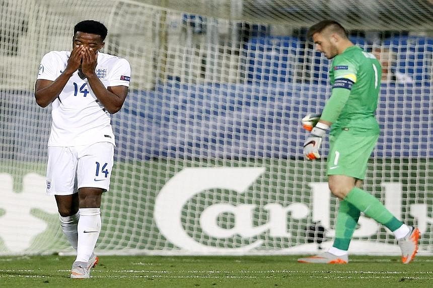 Nathaniel Chalobah and Jack Butland are downcast after England's 0-1 defeat by Portugal in the Czech Republic. They need to end their 10-match winless streak in the European Under-21 Championship against Sweden to stand a decent chance of progressing