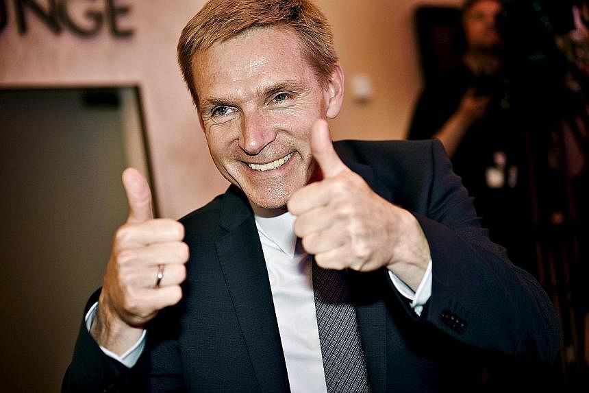 Liberal Party leader Lars Lokke Rasmussen (above) is expected to become prime minister, although the Danish People's Party of Mr Kristian Thulesen Dahl (right) is the winning bloc's biggest group.
