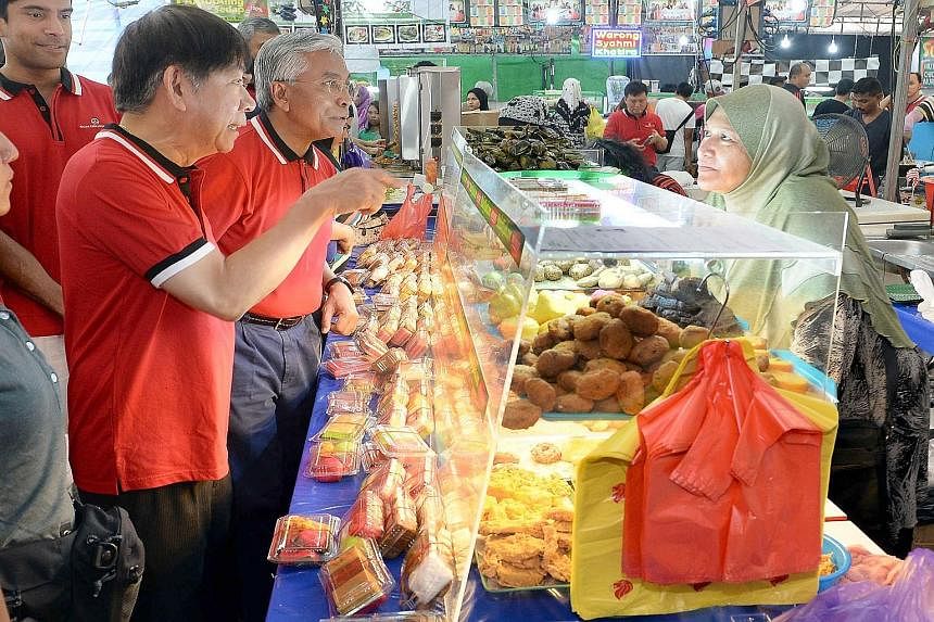 National Development Minister Khaw Boon Wan officially opened Bazar Raya Utara 2015. He was among 50 non-Muslims who fasted yesterday.