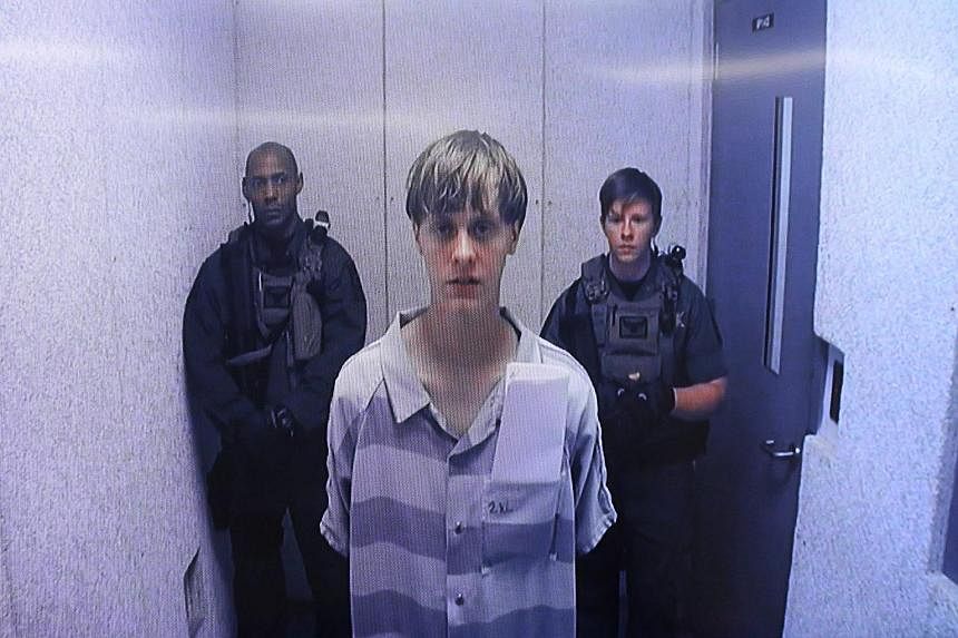 Suspect Dylann Roof appears via video link at a bond hearing in court in North Charleston, South Carolina. The judge set Roof's bail at US$1 million.