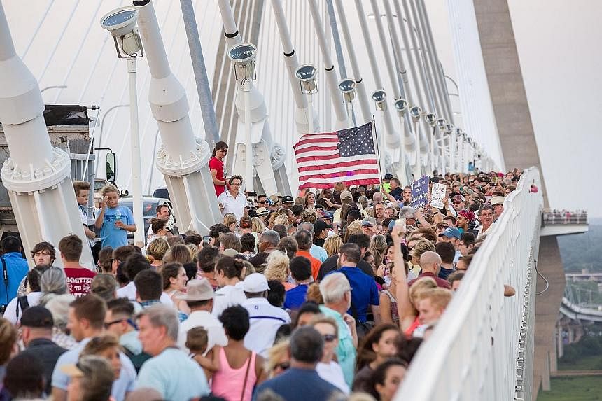 Thousands of people gathering across the Arthur Ravenel Bridge to forge what organisers called a Bridge to Peace Unity Chain nearly 4km long.