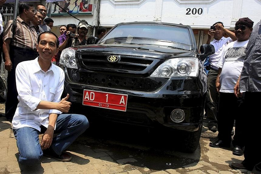 Then Solo Mayor Joko Widodo with the Esemka car in February 2012. Muhammadiyah, whose push to become a force in the economic and corporate spheres has been spurred by the success of its "constitutional jihad", seeks the Indonesian President's backing