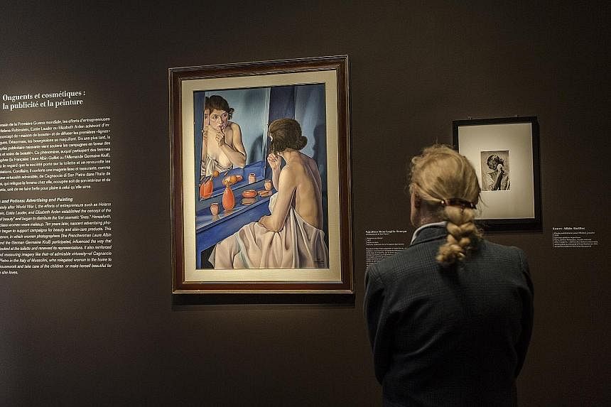 The display of more than 100 works at the Musee Marmottan Monet in Paris includes Natalino Bentivoglio Scarpa's Woman At The Mirror (left) and Study For Phebel Powder Advertisement (right) by Laure Albin Guillot.