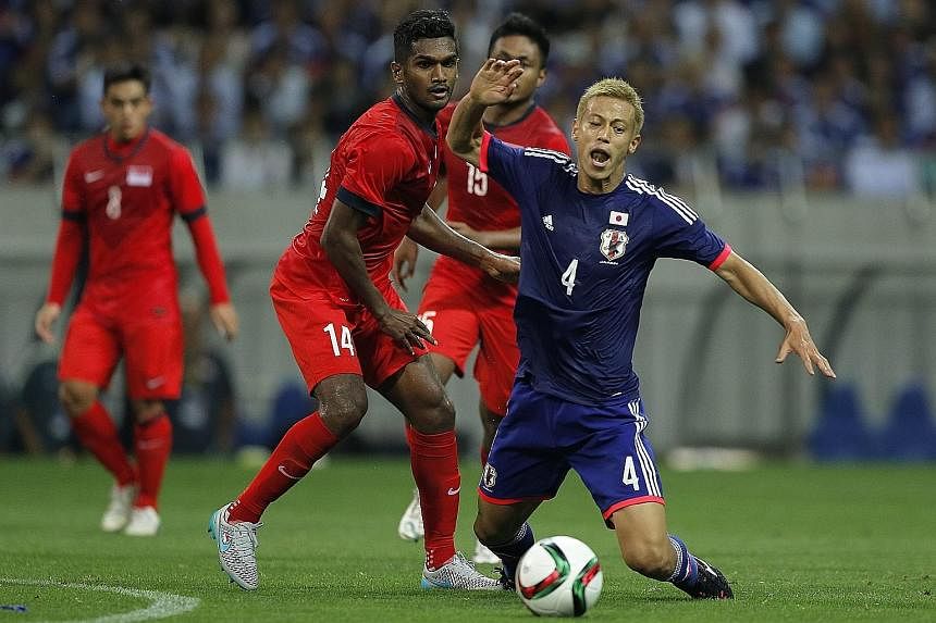Japanese players, such as Keisuke Honda (right) who featured in a recent World Cup qualifier against Singapore that ended 0-0, have proven themselves to be good enough to ply their trade in Europe.