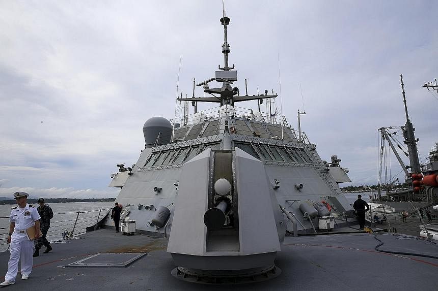 The USS Fort Worth docked at the harbour in Puerto Princesa in Palawan, Philippines, on Monday. A week before it was deployed to Asia, tests exposed its vulnerability to a potential enemy attack.