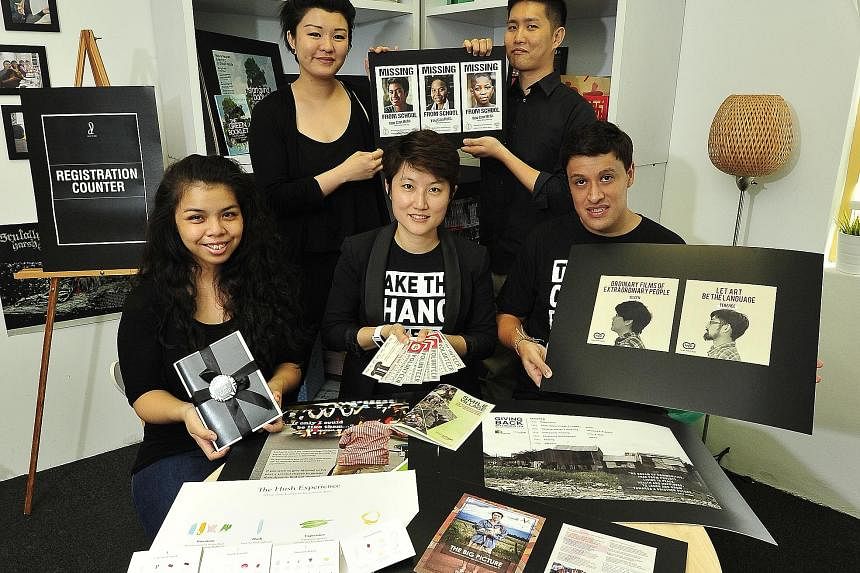 The team behind social enterprise Make The Change (clockwise from bottom left): designer Ashley Granadoz, junior art director Xiner Yeo, marketing manager Ray Chia, and co-founders Pedro Aguirre and Michelle Lim.