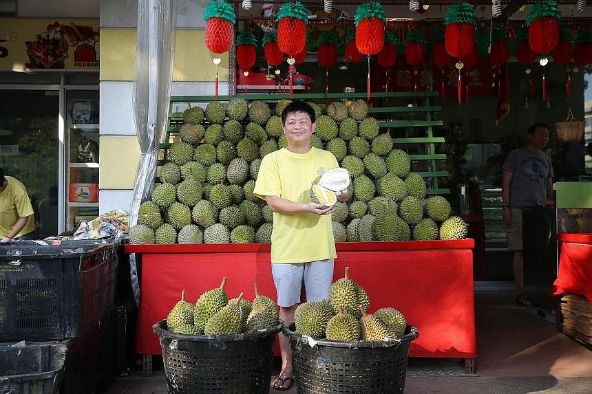 For Mr Goh Meng Chiang, using an organic fertiliser to grow his durian plants has proved to be fruitful because the durians taste better.