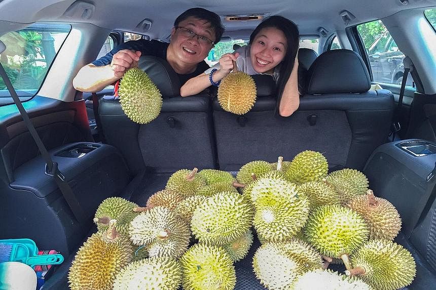 Crowds have been gathering at Delight Fruit Trading where the durians have been going for $1 each and the premium Mao Shan Wang variety for $5. Mr Peter Loh, with his daughter Natasha, celebrated Father's Day last weekend by organising a durian gathe