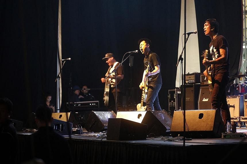 Melodic punk band The Caulfield Cult (above) gave a tireless and vigorous performance while new singer-songwriter Linying (left) opened the festival in a laidback style.
