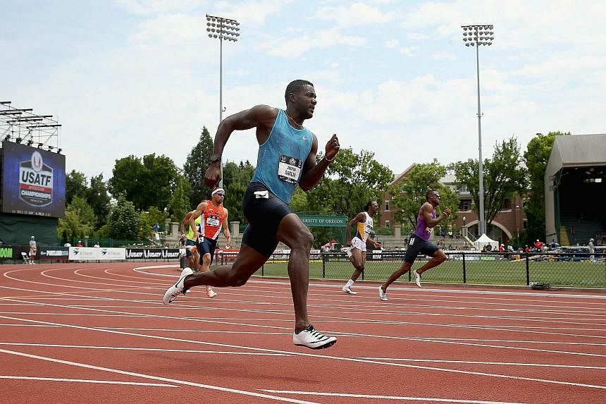 Justin Gatlin rounding the bend in the lead during the 200m heats in the USA Outdoor Track & Field Championships. He is gearing up to challenge Usain Bolt in the World Championships.