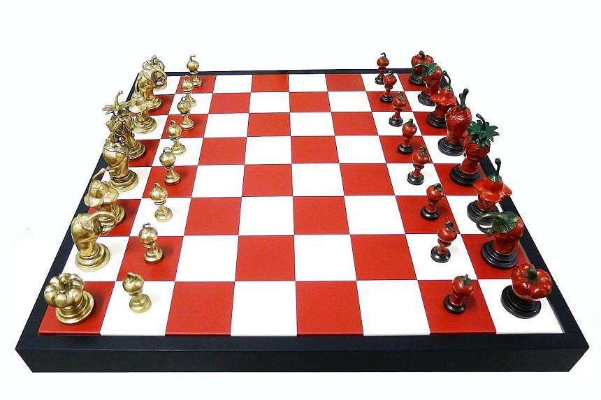 Kumari Nahappan's chilli chessboard artwork, Moves On Spice.