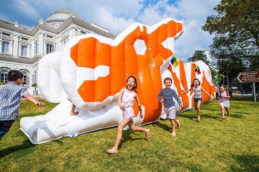 The bouncy castles on the front lawn of the National Museum based on images of HDB playgrounds of the 1970s and 1980s.
