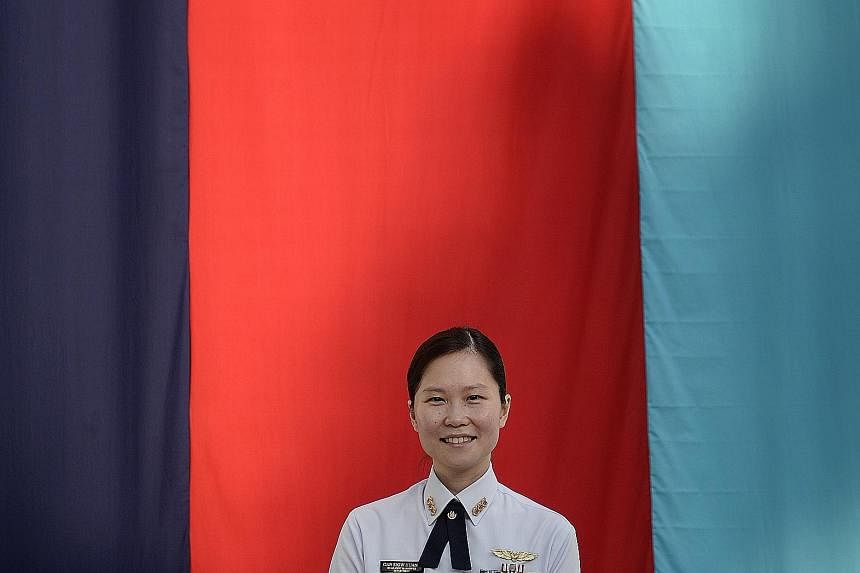 Air force officer Gan Siow Huang is the first SAF woman combatant to rise to the rank of brigadier-general. She was among seven colonels who received their first star as brigadier-general or rear-admiral last Friday. They will wear their new ranks on