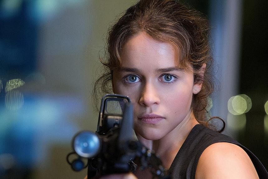 Emilia Clarke (right) fights to save the world as Sarah Conner (above) in Terminator Genisys.