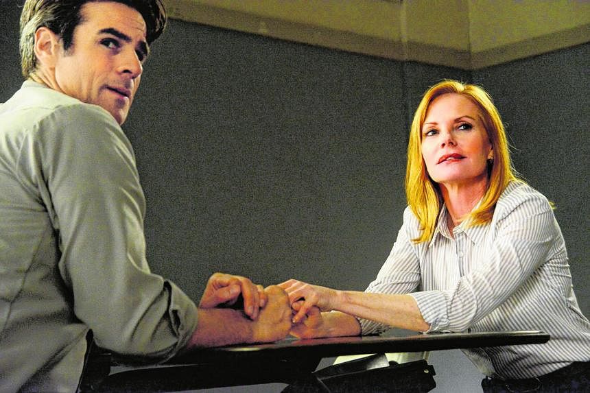 Marg Helgenberger (above with co-star Eddie Cahill) is Christine Price in Under The Dome.