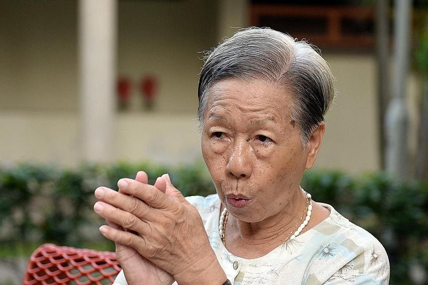 Residents of Ghim Moh estate often hear their neighbour Theresa Lee even before they see her - her trademark whistling announces her presence as she roams the neighbourhood.