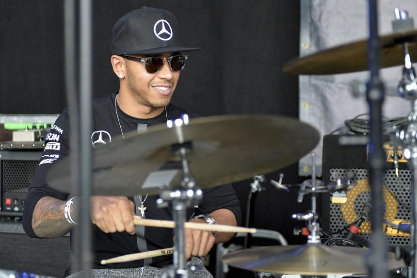 British Formula One driver Lewis Hamilton entertaining the crowd during a fan event at the Red Bull Ring circuit in Spielberg, Austria two weeks ago. The world champion was beaten by his Mercedes team-mate in the race and is eager to get back to winning w
