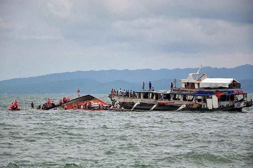 The Kim Nirvana tipped over in unexplained circumstances about half an hour after setting sail from the port of Ormoc in Leyte province yesterday. A search and rescue operation is now under way.