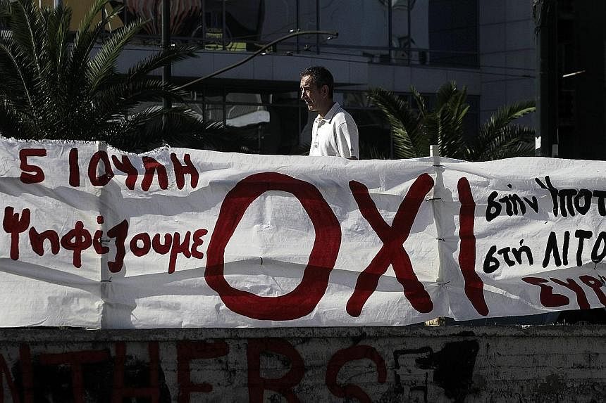 A banner in support of a "no" vote for Sunday's referendum in Athens. Moody's warned that creditors are now less likely to support Greece, regardless of the outcome of the referendum over bailout terms.