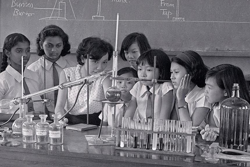 A lesson being conducted in a school laboratory in 1966.