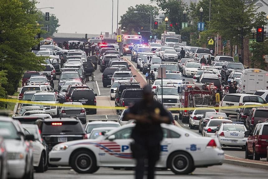 Police blocked off several blocks outside the Washington Navy Yard during a lockdown in Washington yesterday, resulting in a huge traffic jam outside the complex. Reports of a shooting in the complex turned out to be a hoax.