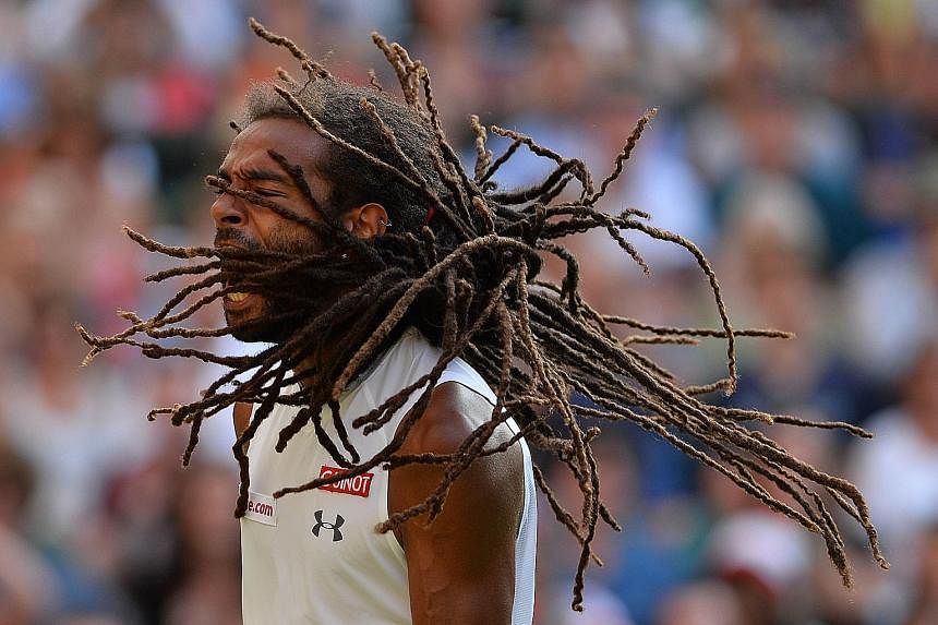 Dustin Brown's stirring performance in his second-round win against Rafael Nadal has been described by tennis legend John McEnroe as the finest by a low-ranked player on Centre Court.