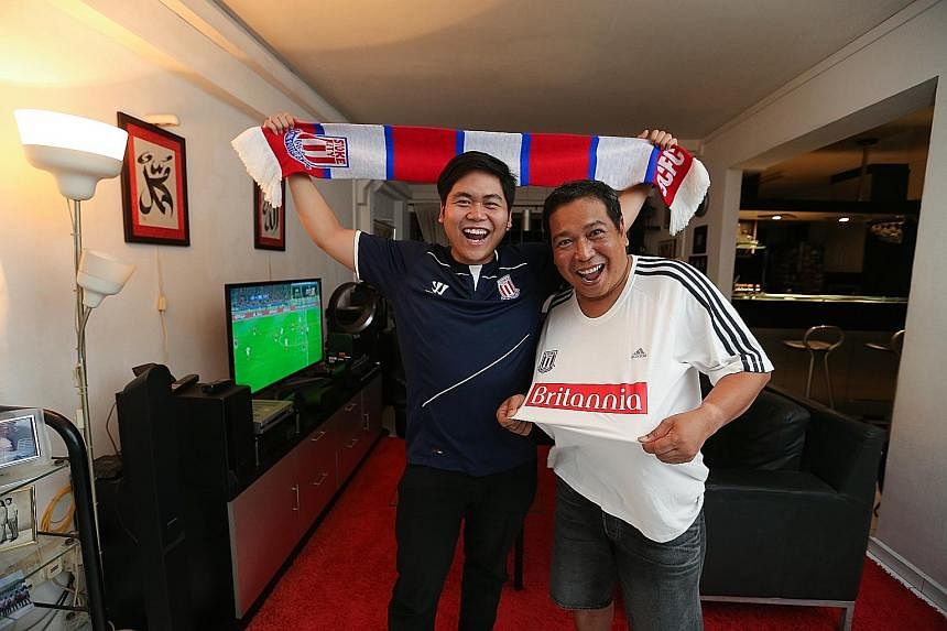 Stoke City fan Mann Mohamed (right) and his young friend Faiz Abdullah share the similarity of being one of the few local supporters of the mid-table English football club.