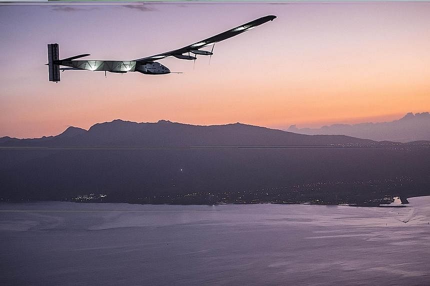 The Solar Impulse 2 completed a historic flight in its quest to circle the globe without using a drop of fuel on Friday. The solar-powered plane, piloted by Swiss aviator Andre Borschberg, landed in Hawaii after a five-day voyage from Japan. It had s