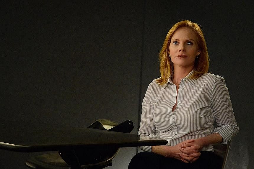 Marg Helgenberger (above) of CSI fame plays a mysterious therapist in Season 3 of Under The Dome (left).