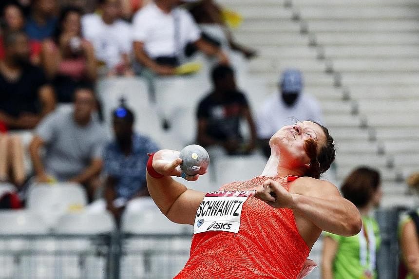 Valerie Adams (above), who was returning after shoulder surgery, had to settle for fifth place in the women's shot put won by Christina Schwanitz (left) at the Paris Diamond League meet.