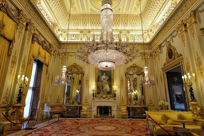 The White Drawing Room, with its ornate ceiling, brocade curtains and gilded furniture, is where the royal family have been photographed since 1947.