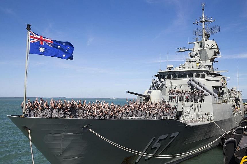 The crew of HMAS Perth, a Royal Australian Navy frigate, cheering last Thursday as they arrive in Darwin in preparation for the commencement of Exercise Talisman Sabre 2015. About 40 personnel from Japan's army will join the American contingent for t