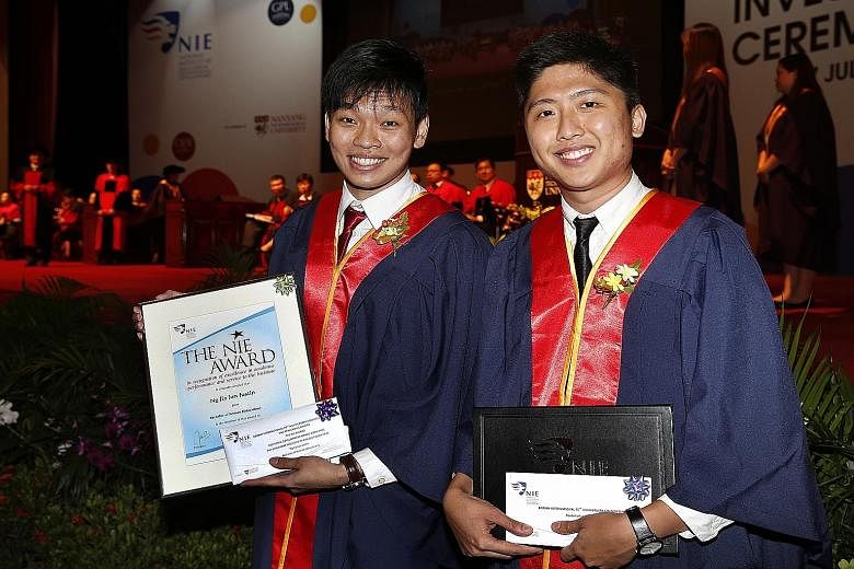 Valedictorian Justin Ng (left) and fellow NIE graduate Perdana Putra at yesterday's investiture ceremony, which was held at the NTU auditorium. It is the first of three ceremonies in which a total of 1,216 new and returning teachers will graduate