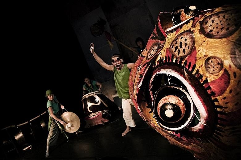 Into The Flood (left) is an environmental parable that incorporates ethnological music, puppetry and masks. Veteran stage actor Yong Ser Pin (centre), with performer Kuo Jing Hong (far left) and director Liu Xiaoyi (left).