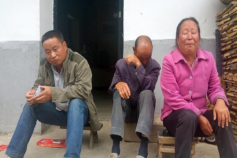 Mr Li Daohong (left) with his parents in Shaanxi province. Mr Li, 35, is too poor to buy a bride and too despondent to try matchmaking. A former victim of bride trafficking in Haryana, India, now remarried and living in a village in West Bengal.