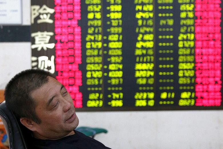 Slumped: The Shanghai Composite lost 1.29 per cent yesterday, while the Shenzhen index dived 5.34 per cent.