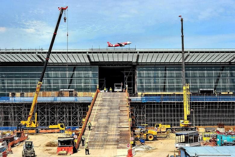 More than 70 per cent of the 195,000 sq m Terminal 4 building has been completed. Besides self-service check-in kiosks for printing of boarding passes and luggage tags, as well as automated immigration clearance, T4 will also feature facial recogniti