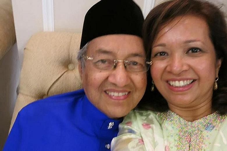 Dr Mahathir Mohamad with his daughter Marina. The statesman turned 90 yesterday and is still sprightly.