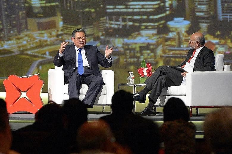 Former Indonesian President Susilo Bambang Yudhoyono (above left) speaking at the DBS Asia Leadership Dialogue, which was hosted by DBS chief Piyush Gupta.