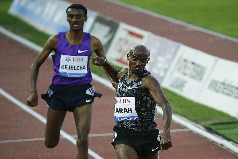 Mo Farah punching out in delight after he finishes ahead of Yomif Kejelcha of Ethiopia in the 5,000m at the IAAF Diamond League meet in Lausanne. The British runner has been in the spotlight after his American coach Alberto Salazar had to fend off ac