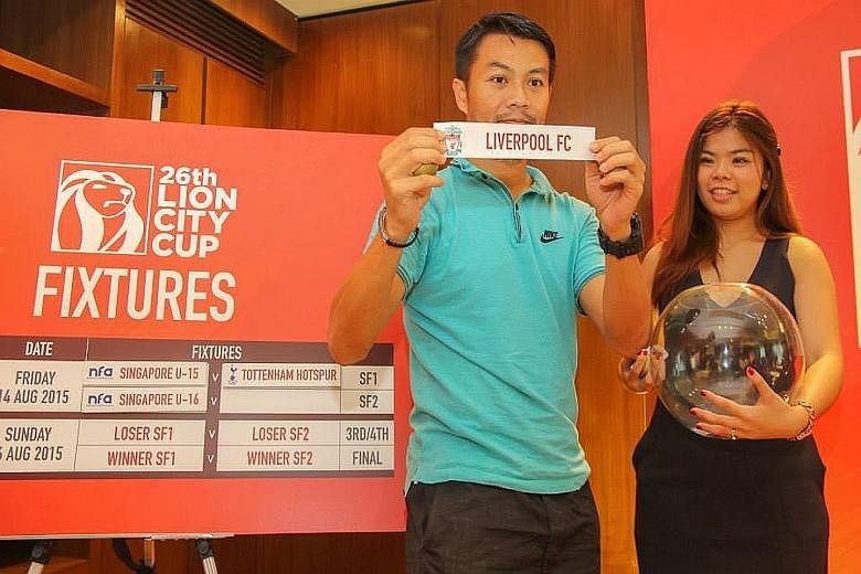 Indra Sahdan, a former Singapore international striker who had played in the Lion City Cup, helps to conduct the draw for the August event.